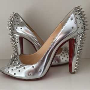 Christian Louboutin spiked platform pumps.